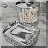 D67. Restoration Hardware soap dish ($12) and glass and chrome jar ($18) 